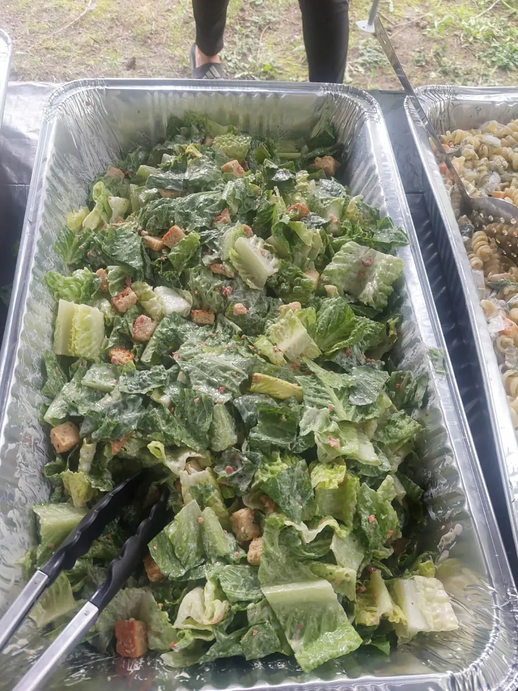 Large tray of fresh green salad with croutons